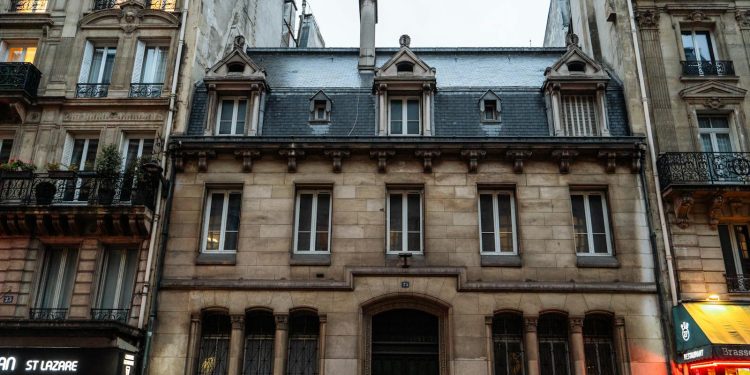 Elegant Parisian Corner Building at Dusk
